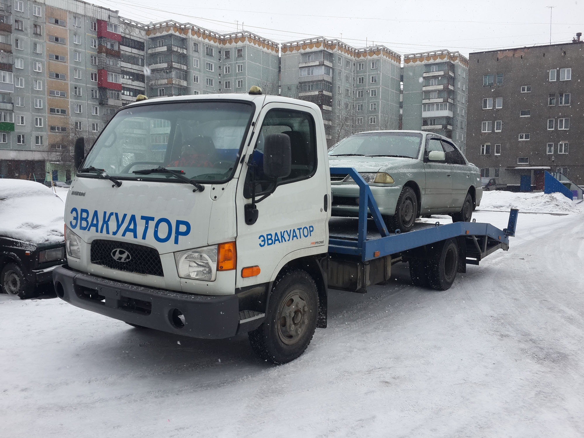 Фото эвакуации легкового автомобиля