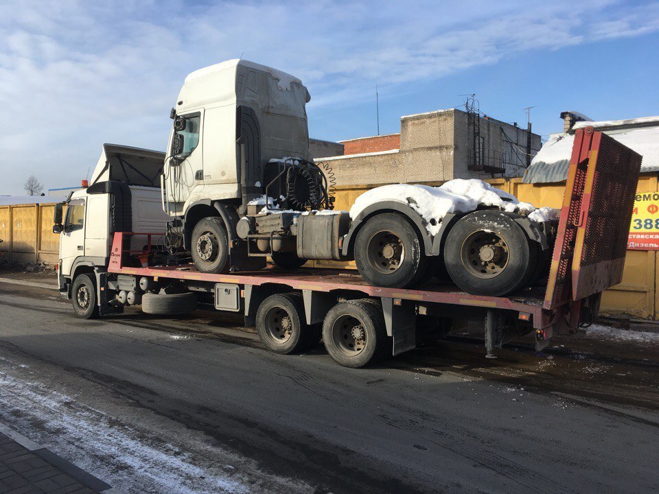 Эвакуация грузовика методом полной погрузки фото